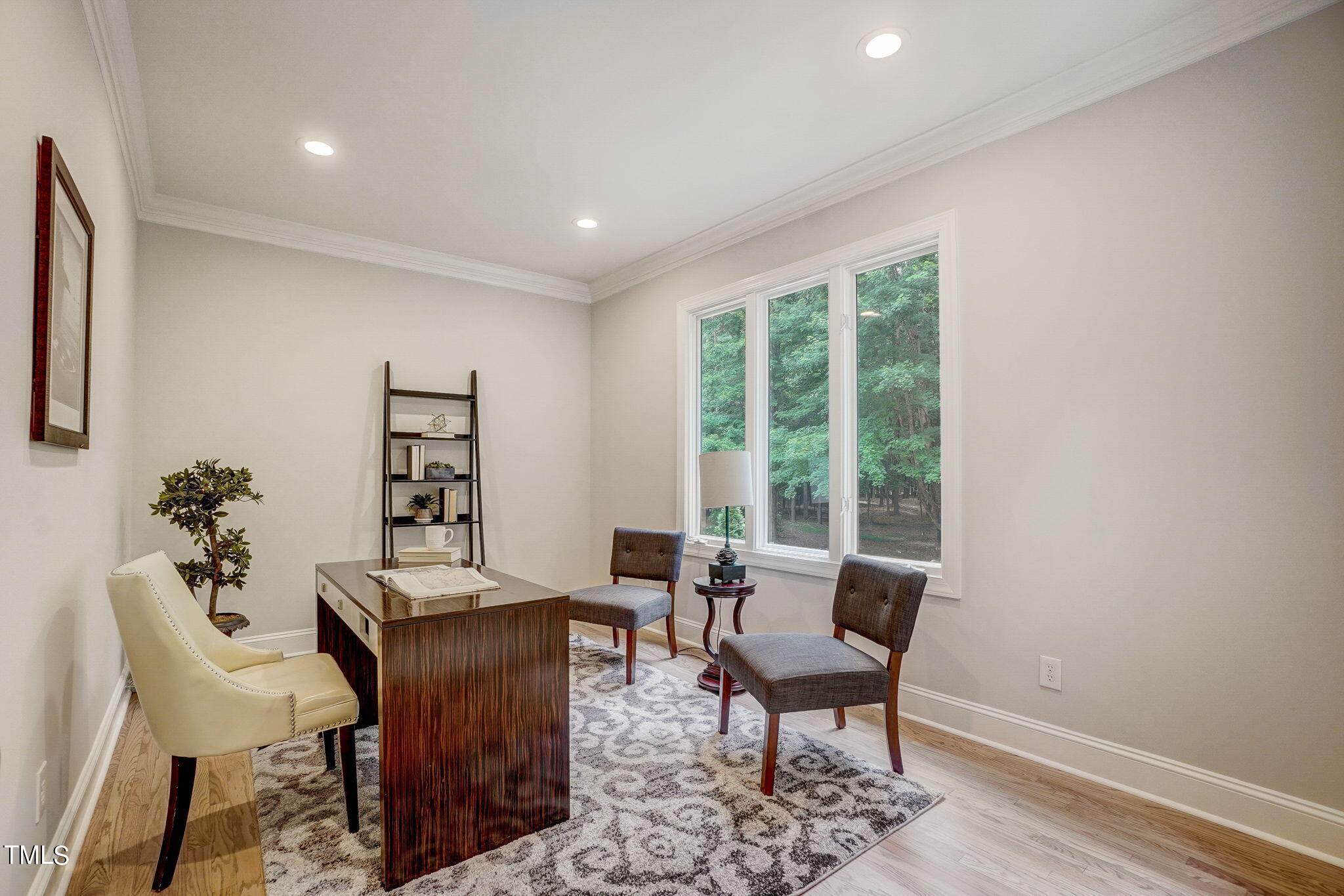 5101 Roseland Court Raleigh, NC 27613 - Photo 36 of 71 a living room with furniture and a window