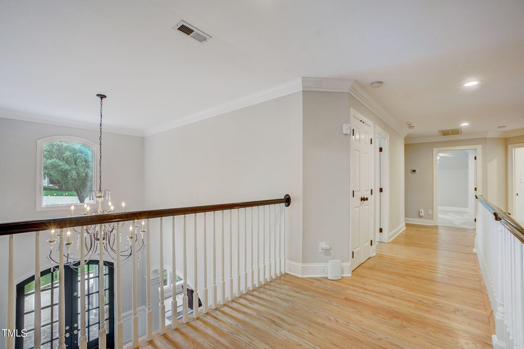 5101 Roseland Court Raleigh, NC 27613 - Photo 37 of 71 a view of a bedroom with wooden floor