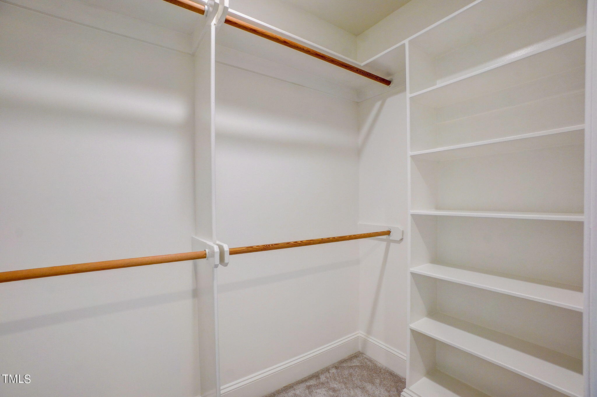 5101 Roseland Court Raleigh, NC 27613 - Photo 41 of 71 a view of an empty walk in closet