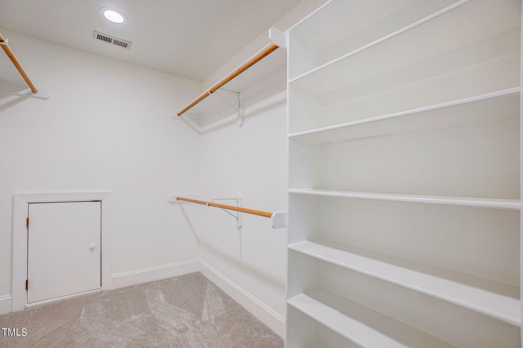 5101 Roseland Court Raleigh, NC 27613 - Photo 48 of 71 a view of an empty walk in closet