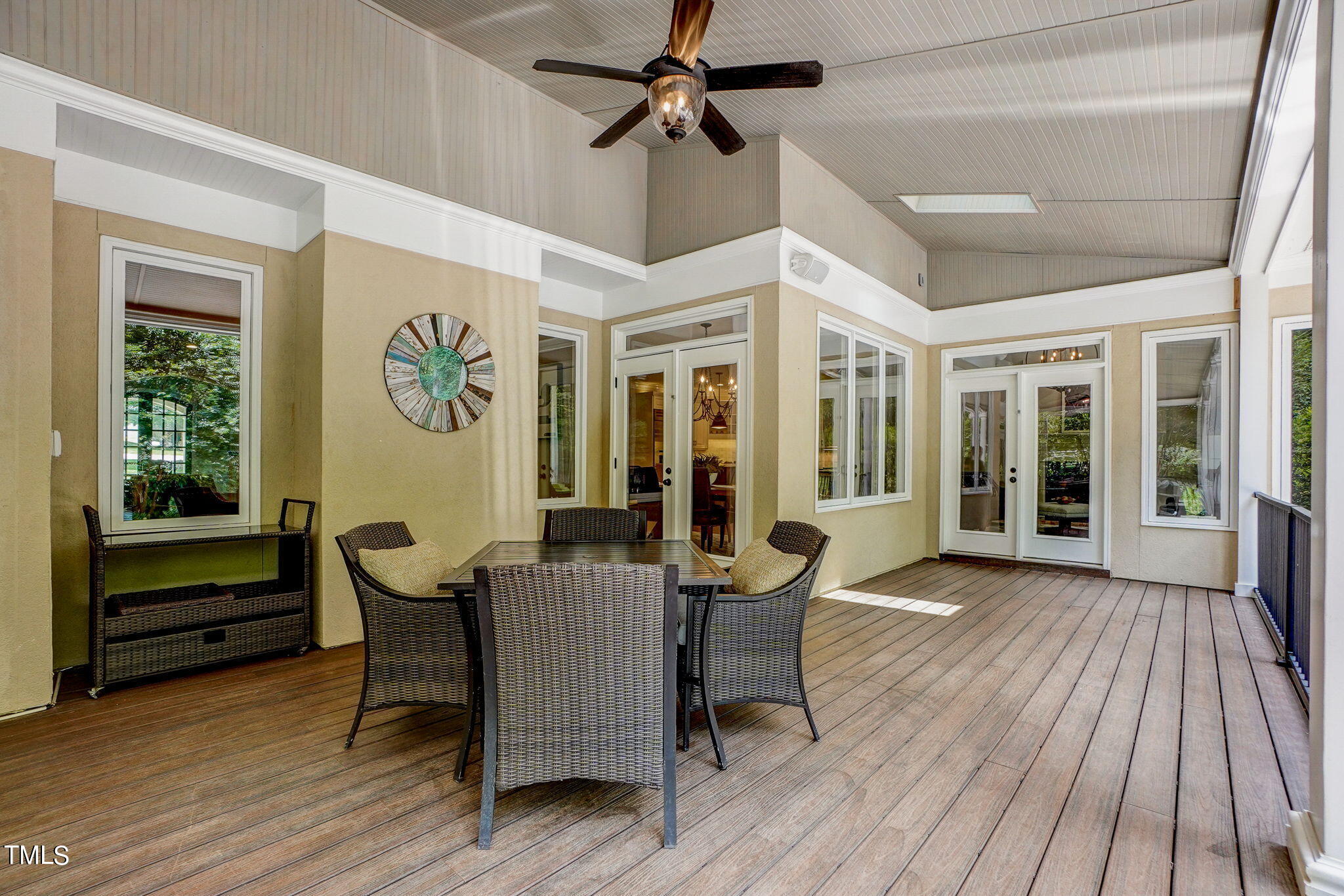 5101 Roseland Court Raleigh, NC 27613 - Photo 65 of 71 a view of a dining room with furniture window and wooden floor