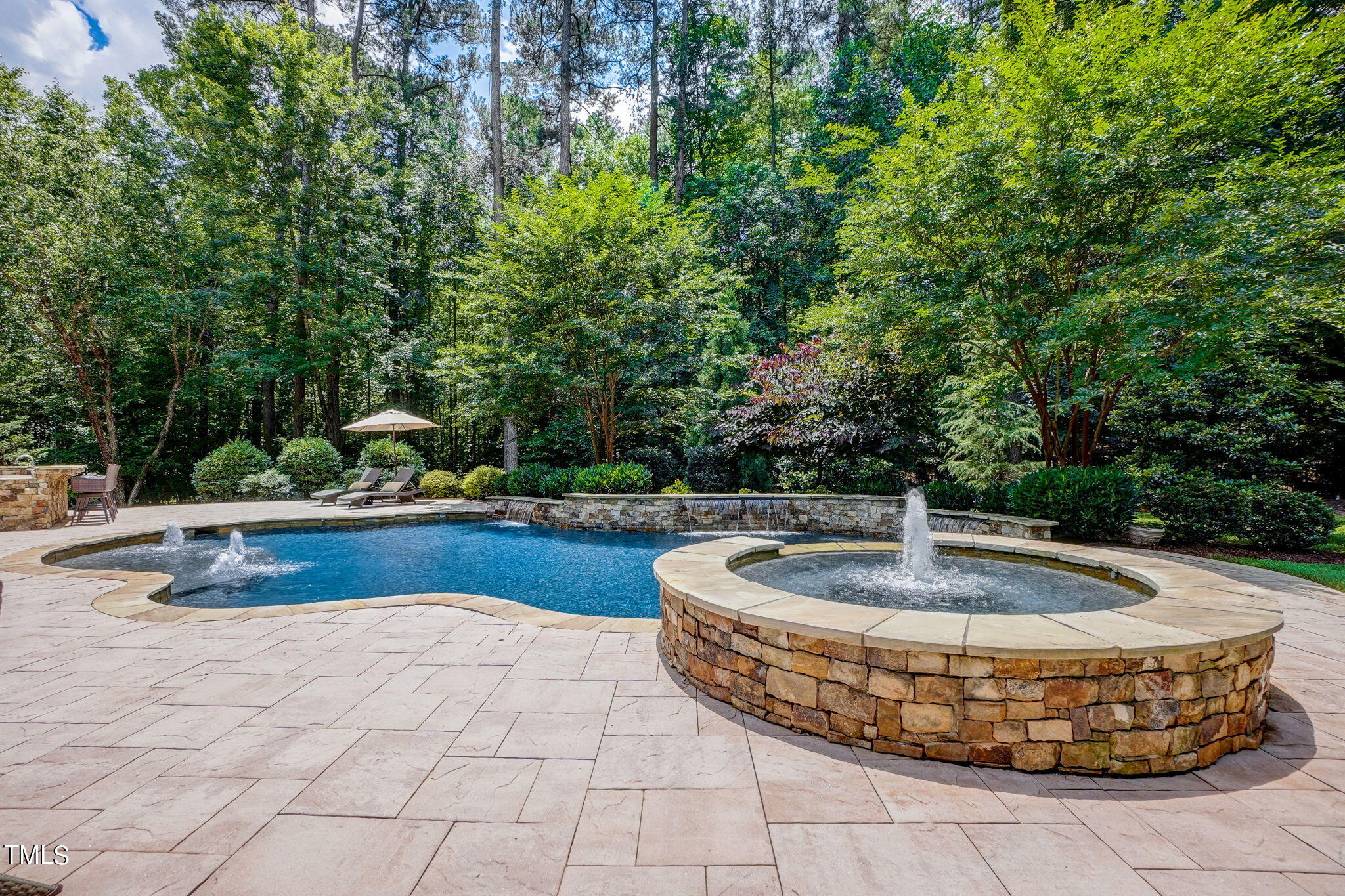 5101 Roseland Court Raleigh, NC 27613 - Photo 69 of 71 a view of a swimming pool with a sitting space