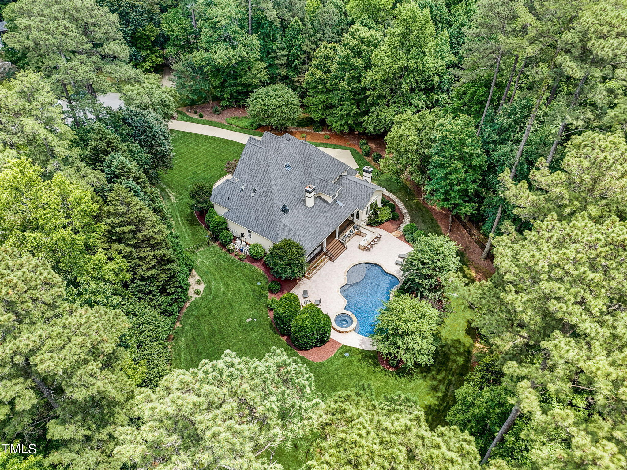 5101 Roseland Court Raleigh, NC 27613 - Photo 71 of 71 an aerial view of a house with a garden
