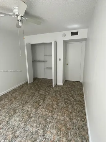 an empty room with closet