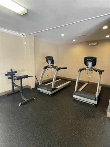 a view of a room with gym equipment