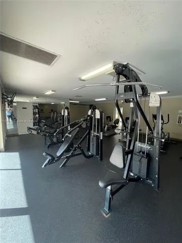 a view of a swimming pool with a yard