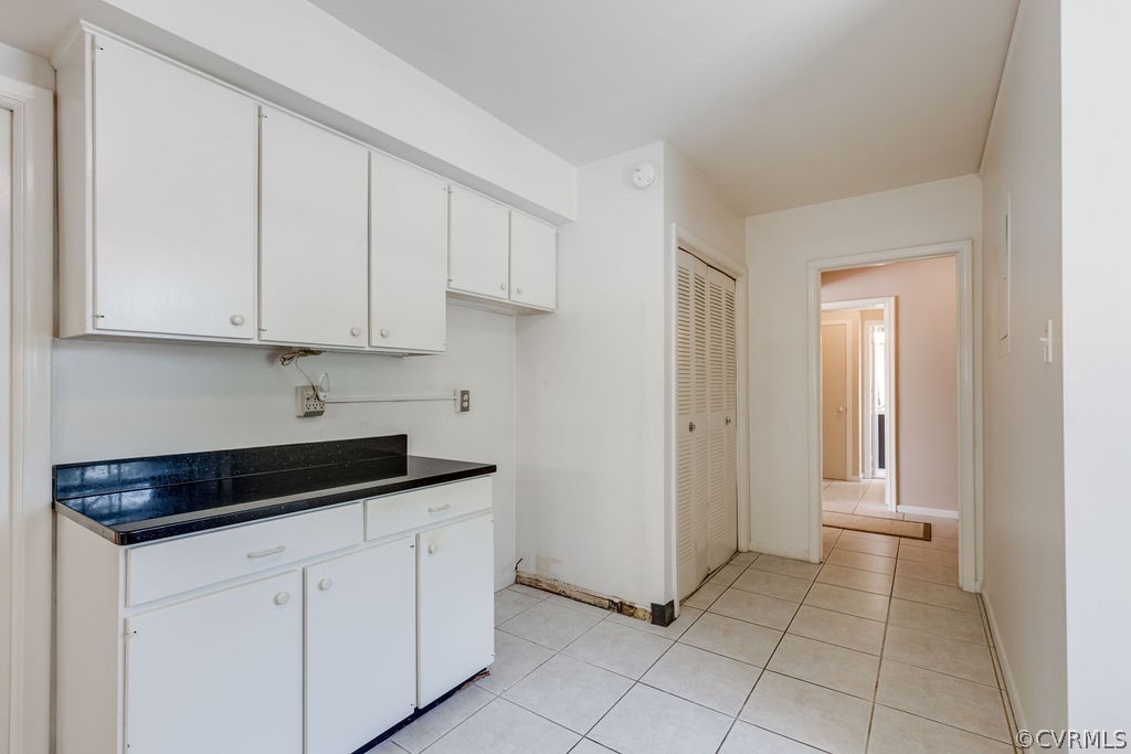 9135 Derbyshire Road, Unit G Henrico, VA 23229 - Photo 11 of 44 a view of a kitchen with white cabinets