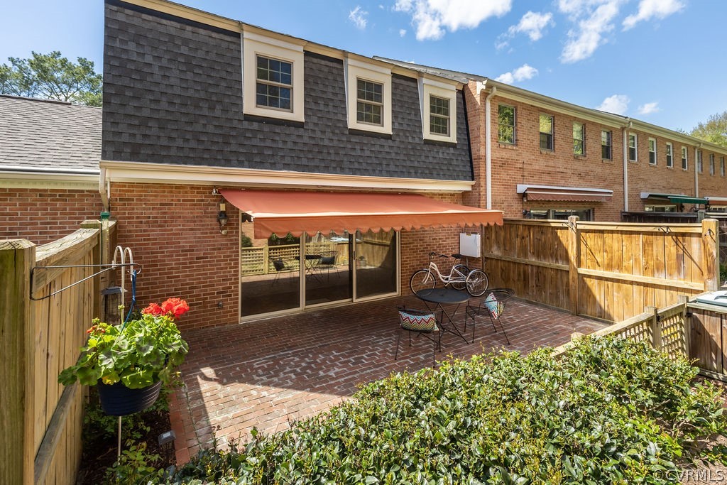 9135 Derbyshire Road, Unit G Henrico, VA 23229 - Photo 38 of 44 a view of a house with a patio