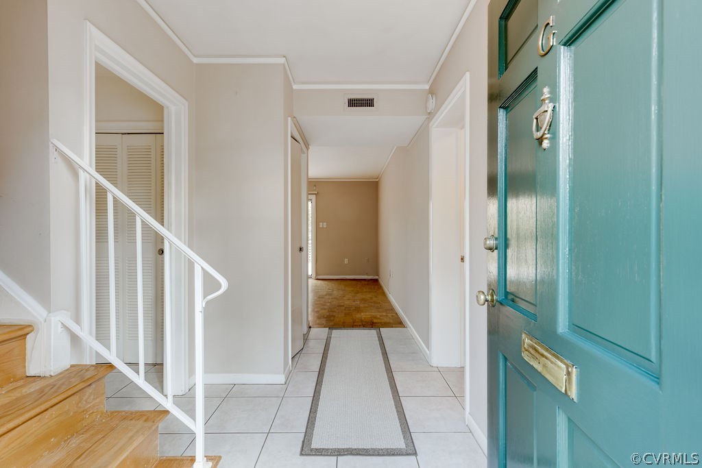 9135 Derbyshire Road, Unit G Henrico, VA 23229 - Photo 4 of 44 a view of a hallway with wooden floor and staircase