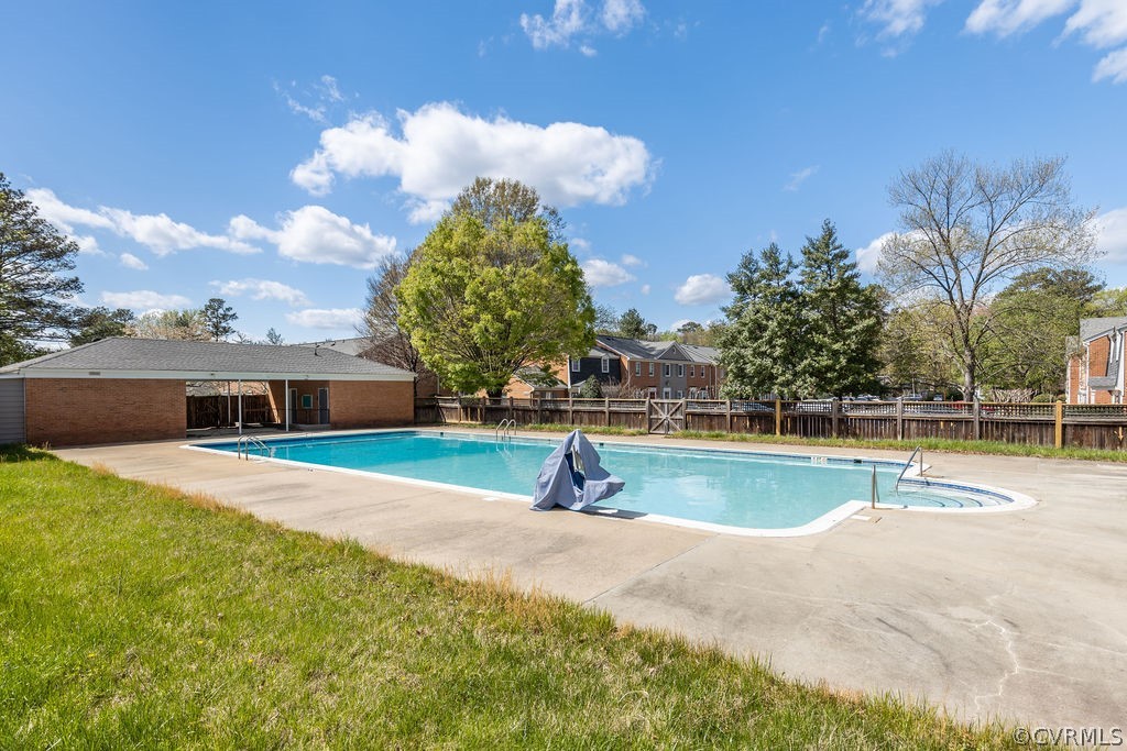 9135 Derbyshire Road, Unit G Henrico, VA 23229 - Photo 41 of 44 a view of swimming pool with outdoor seating and yard in back
