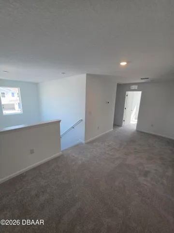a bathroom with a shower and a toilet