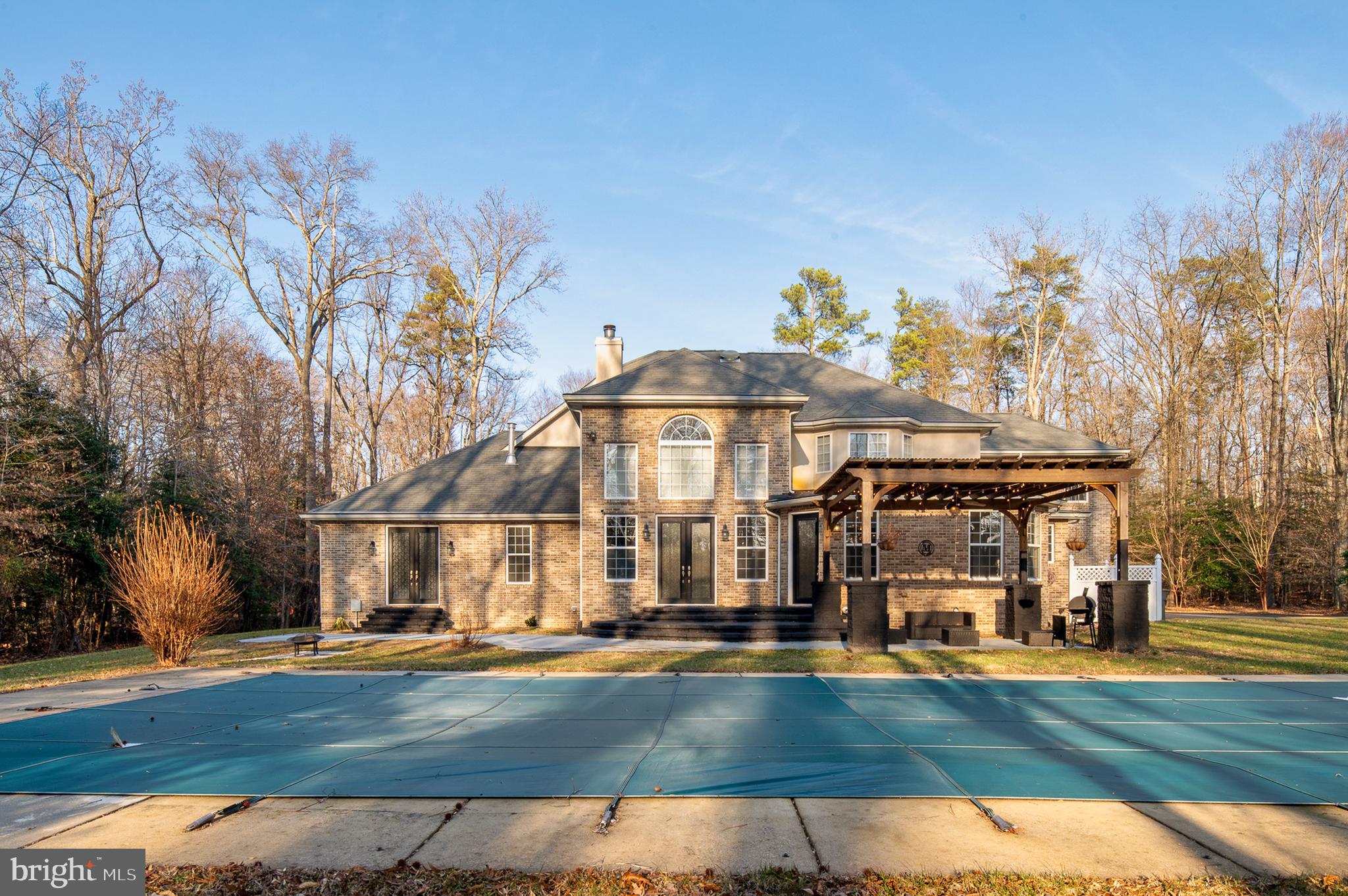 16301 Accolawn Road Accokeek, MD 20607 - Photo 73 of 77 a front view of a house with a yard