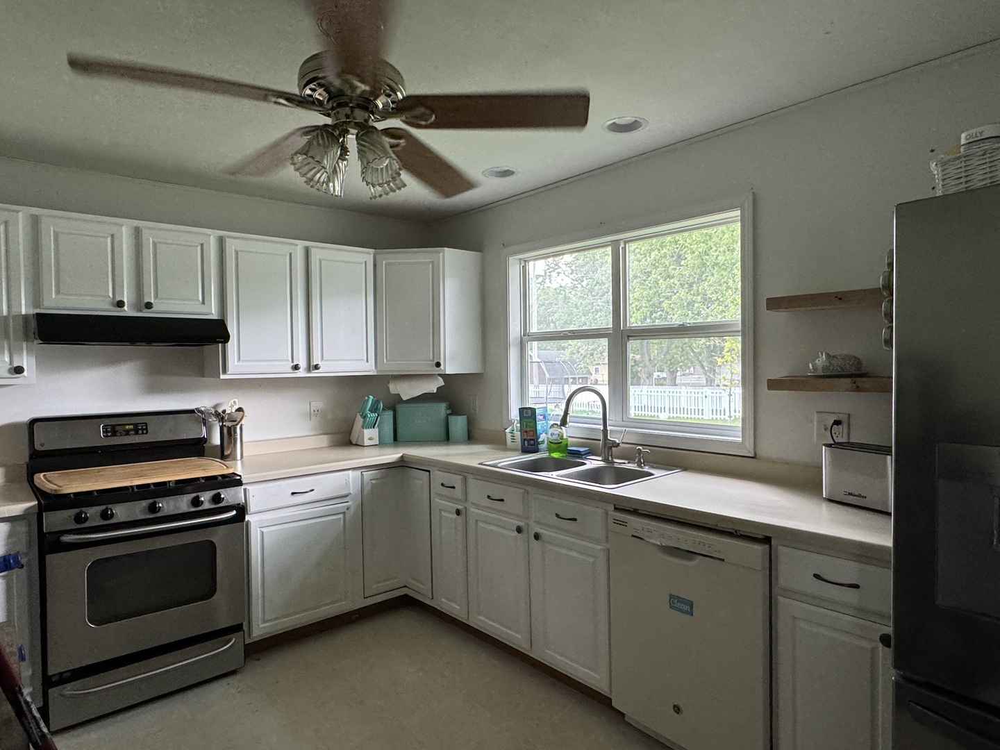 374 North Park Road Herscher, IL 60941 - Photo 6 of 16 a kitchen with a sink stove and cabinets
