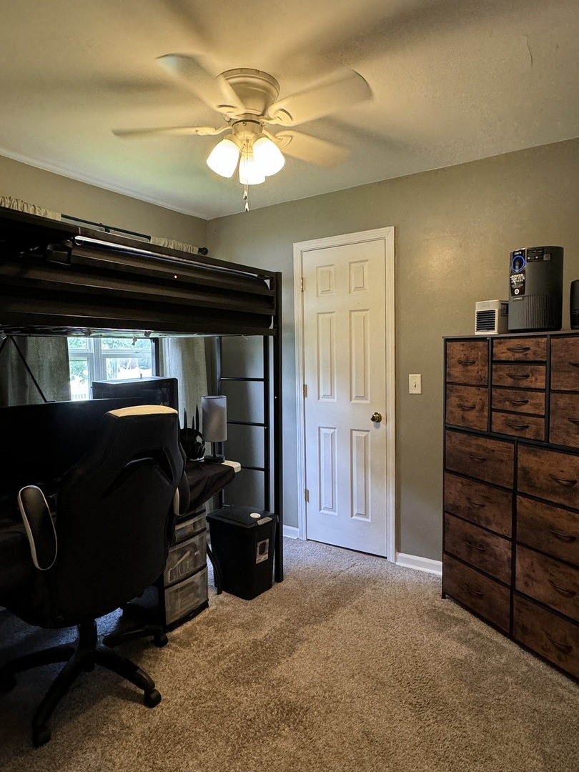 374 North Park Road Herscher, IL 60941 - Photo 9 of 16 a bed room with furniture and a ceiling fan