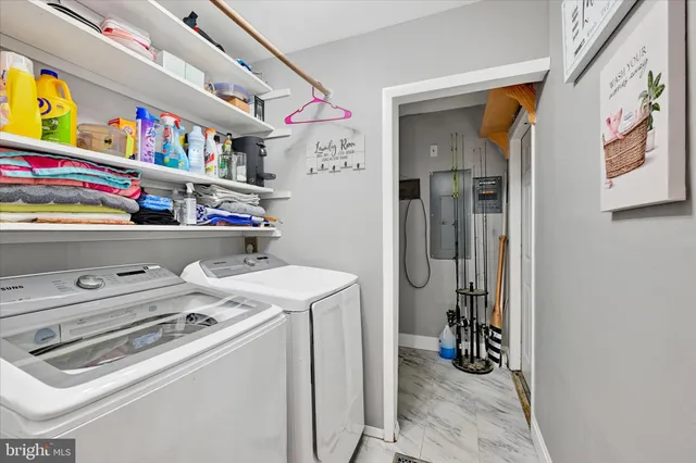 a storage room with washer and dryer