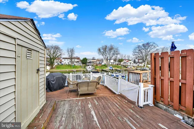 a view of roof deck with patio