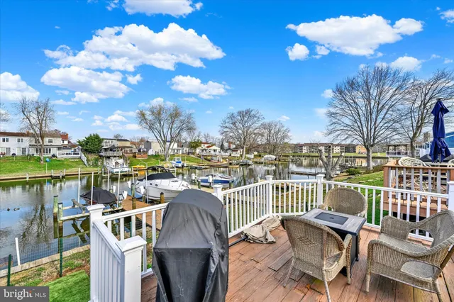 a view of a chairs and table in patio