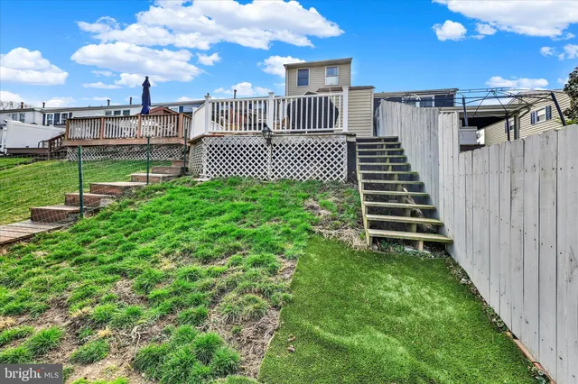 a view of a garden with houses