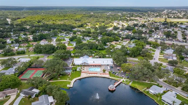 a view of a swimming pool with a lounge chair