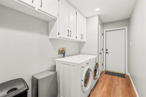 a utility room with dryer and washer