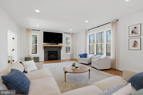 a kitchen with a table and chairs in it