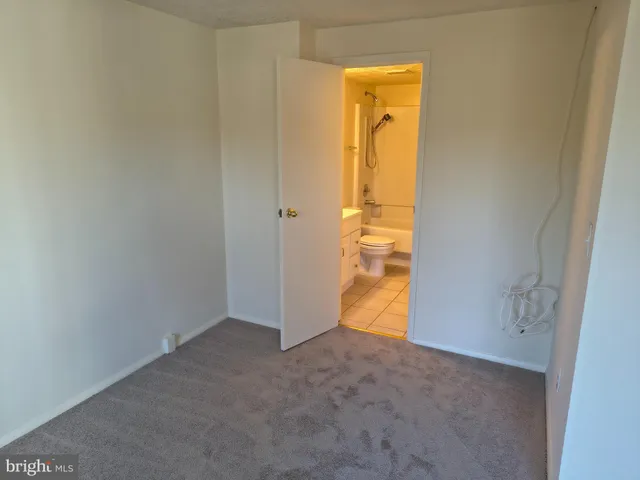 an empty room with a hallway