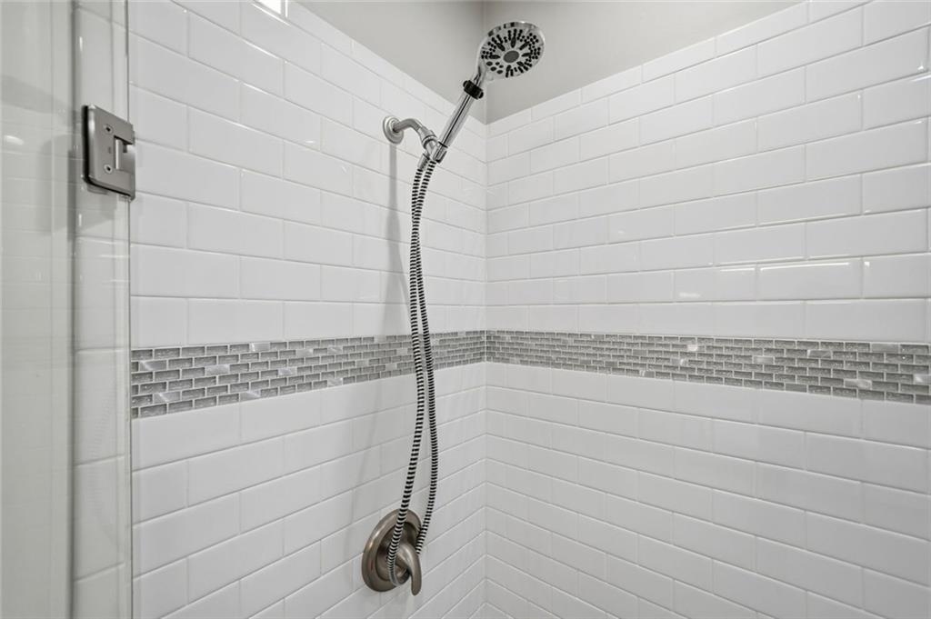 1006 Owens Store Road Canton, GA 30115 - Photo 26 of 48 a bathroom with a shower