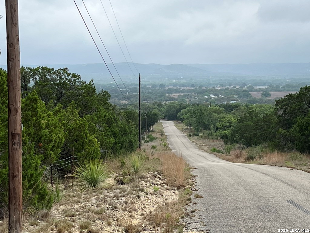 522 Medina Hills Road Medina, TX 78055 - Photo 12 of 15 a view of a road with a yard
