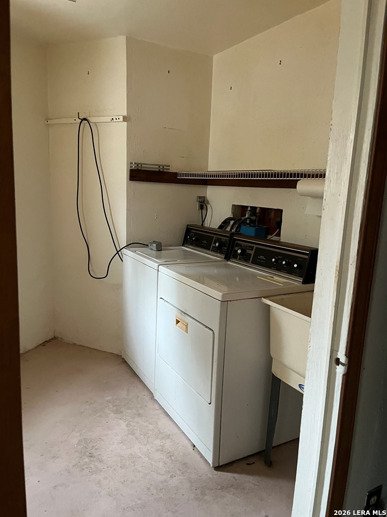 522 Medina Hills Road Medina, TX 78055 - Photo 4 of 15 a utility room with dryer and washer