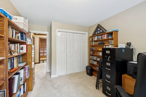 a view of a bedroom with closet