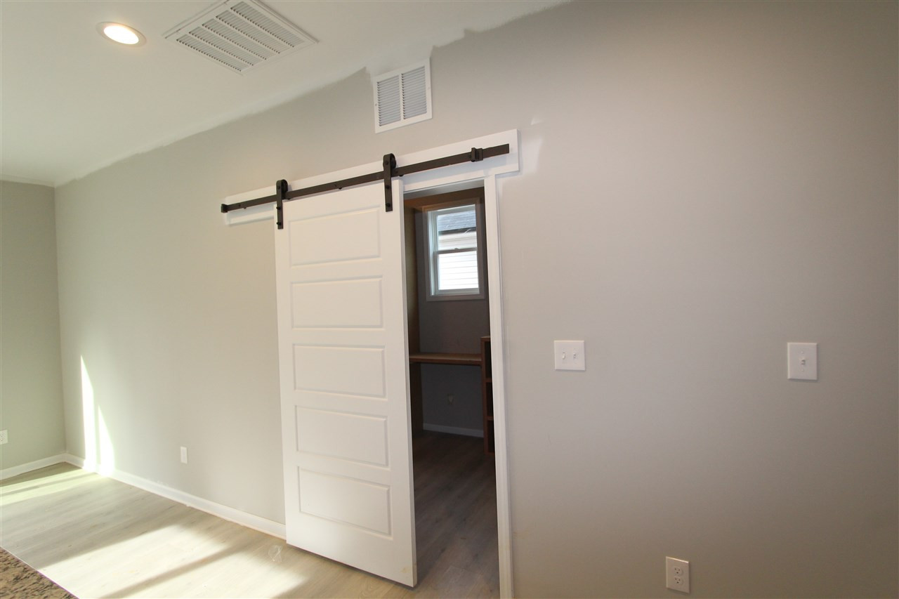 59 Yellow Jacket Ridge Clayton, NC 27520 - Photo 14 of 30 Barn Door to Texas Pantry