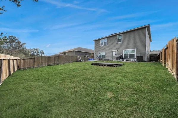 a house view with a outdoor space