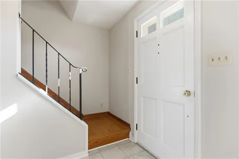 a view of a hallway with staircase
