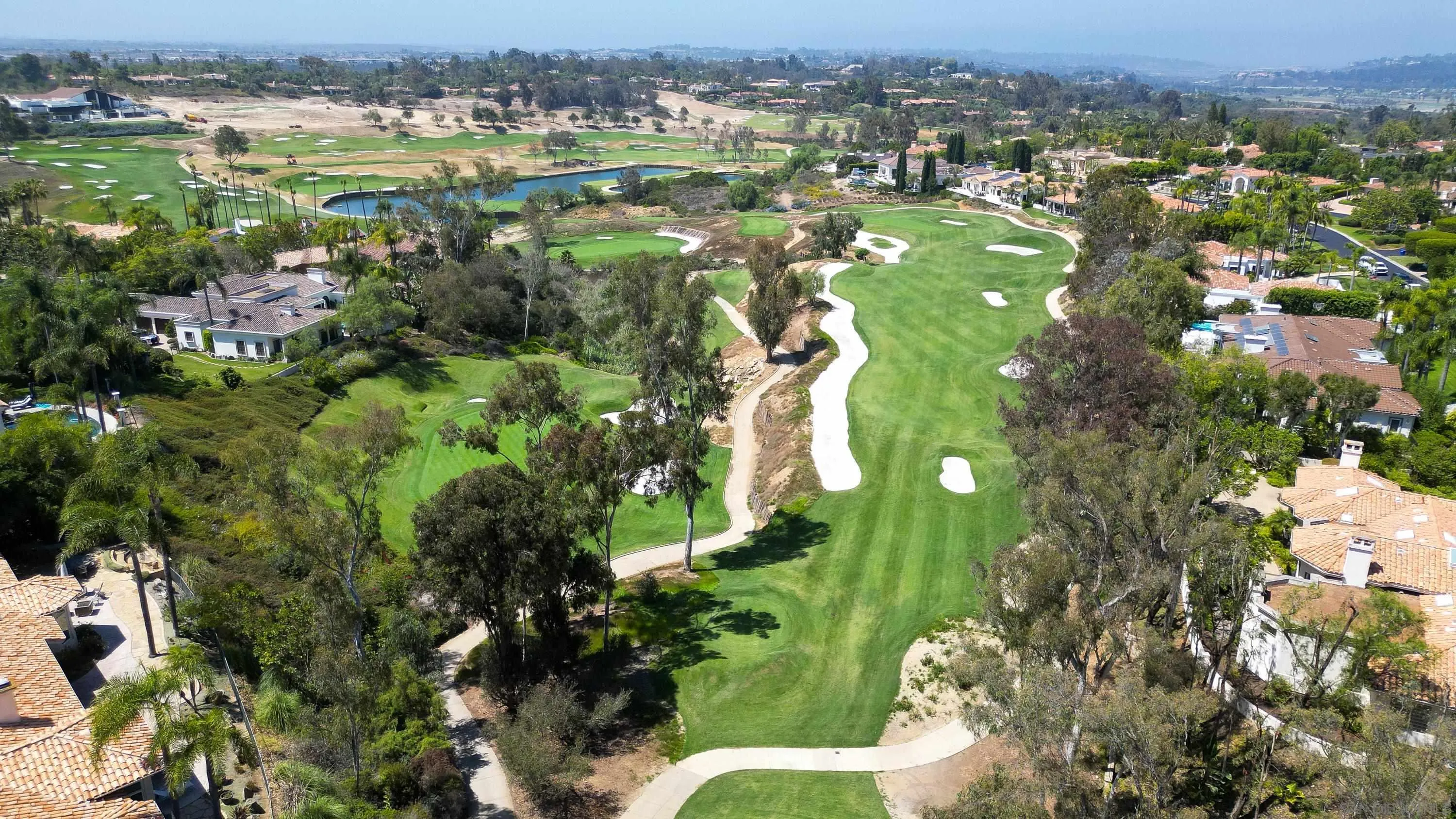 Spyglass Lane, Unit 39 Rancho Santa Fe, CA 92067 - Photo 13 of 21 an aerial view of residential houses with outdoor space and trees