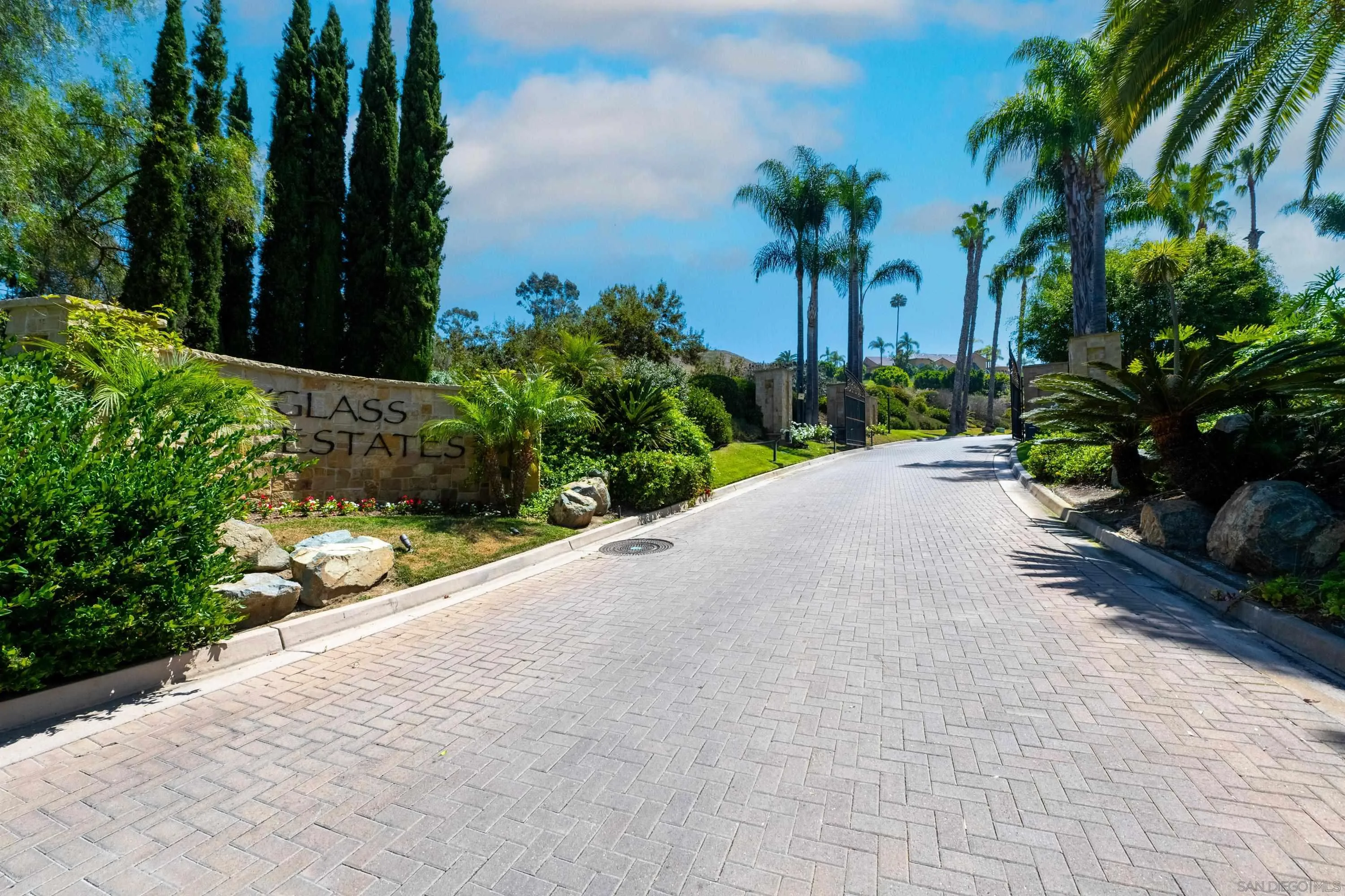 Spyglass Lane, Unit 39 Rancho Santa Fe, CA 92067 - Photo 20 of 21 a view of a garden with palm trees