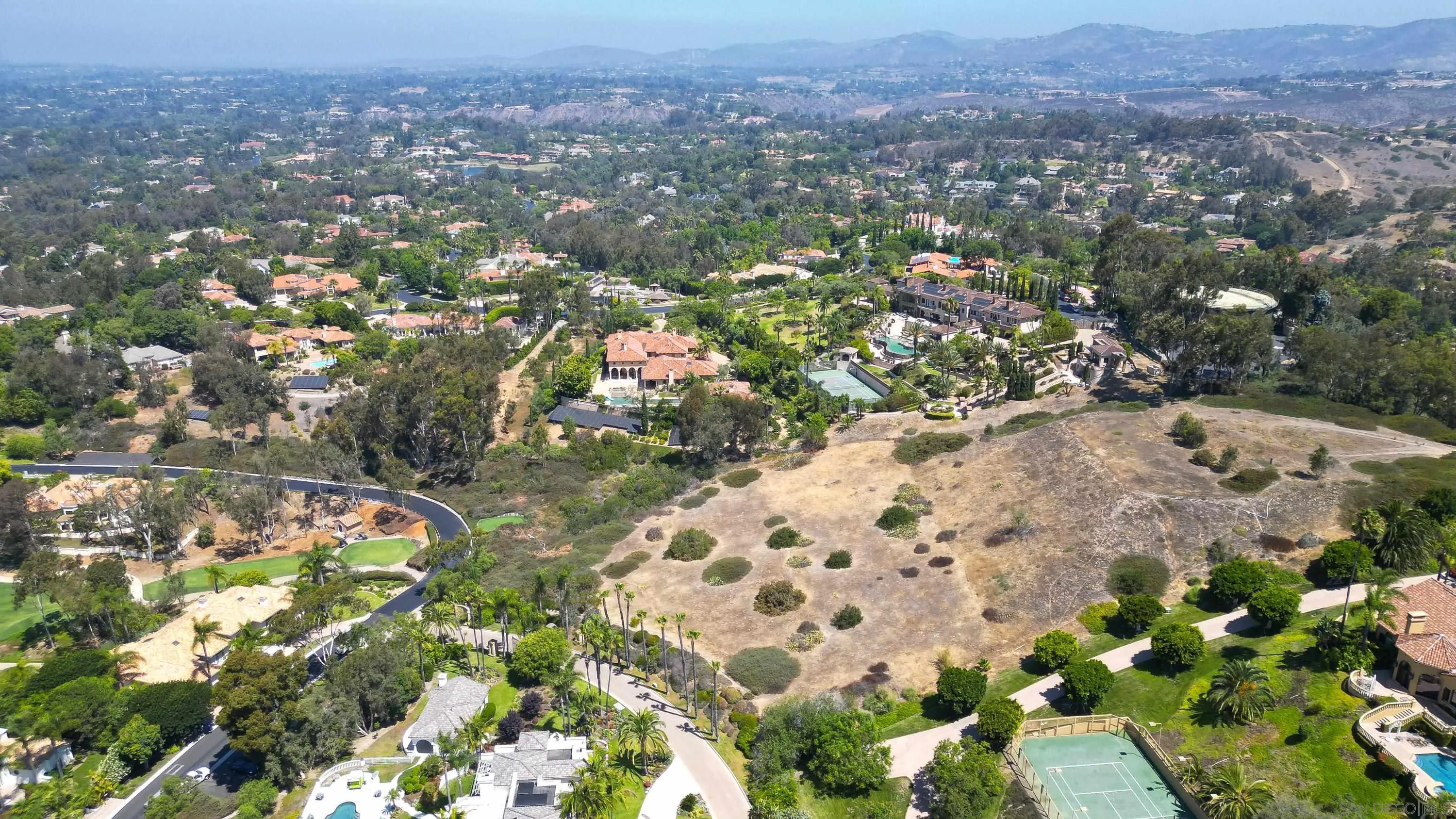 Spyglass Lane, Unit 39 Rancho Santa Fe, CA 92067 - Photo 6 of 21 an aerial view of residential houses with outdoor space