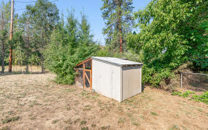 6732 Old Stage Road Central Point, OR 97502 - Photo 44 of 51 a view of a wooden house with large trees