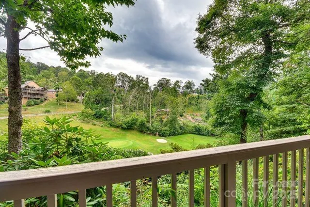 a view of a garden from a balcony