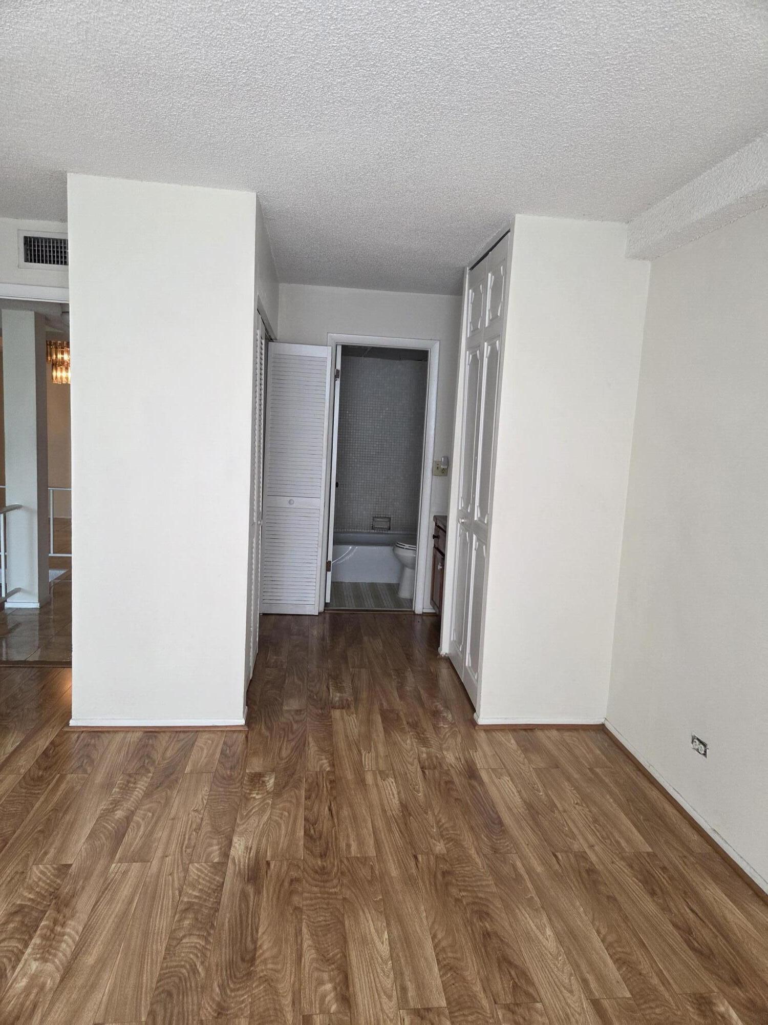 3720 Inverrary Drive, Unit 2B Lauderhill, FL 33319 - Photo 4 of 10 a view of a room with wooden floor