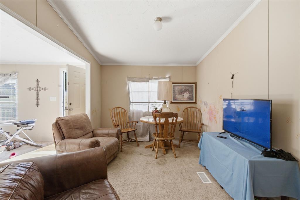 406 Hilltop Meadows Court Springtown, TX 76082 - Photo 20 of 33 a living room with furniture