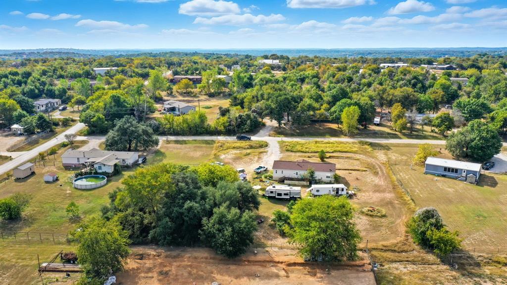 406 Hilltop Meadows Court Springtown, TX 76082 - Photo 7 of 33 an aerial view of a houses with a yard