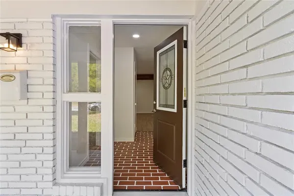 a view of a entryway door front of house