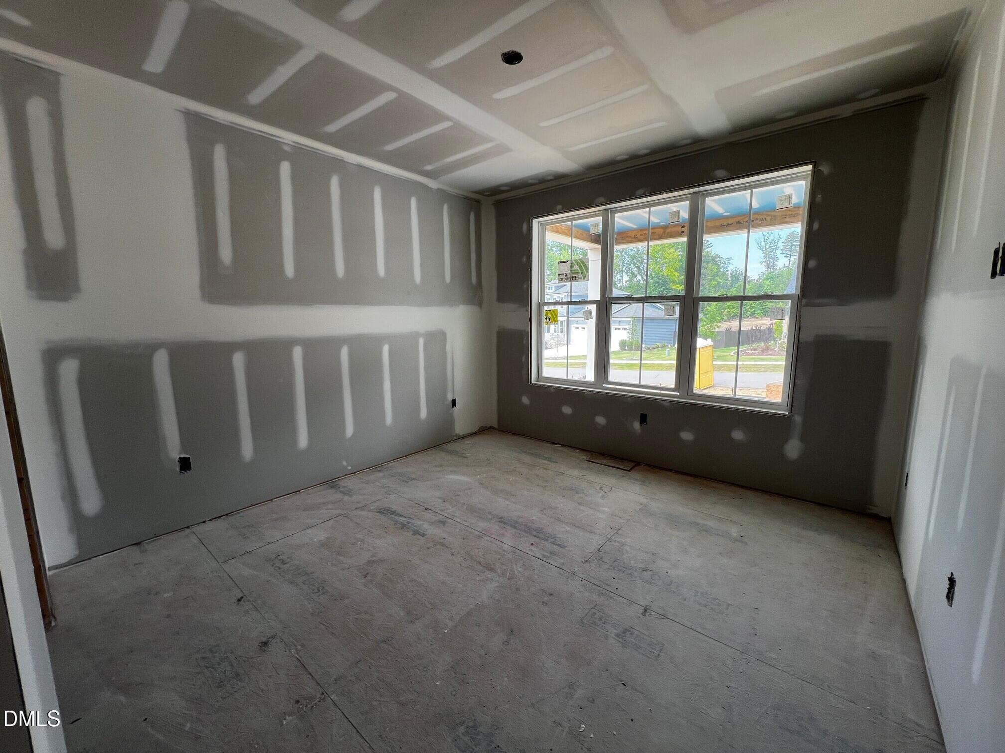 6055 Scalybark Road Durham, NC 27712 - Photo 10 of 30 1st floor guest bed
