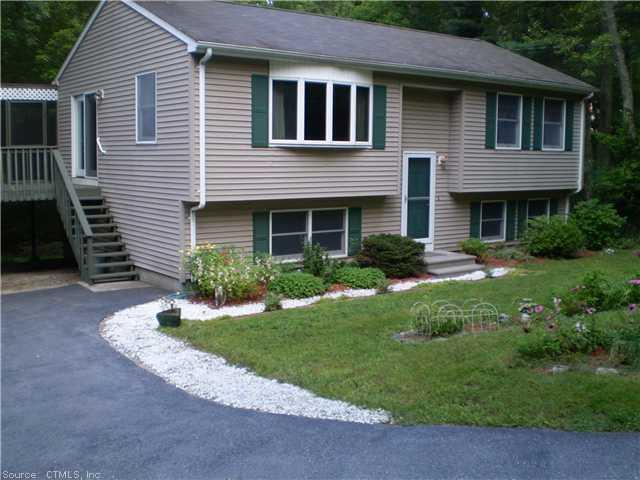 155 North Sterling Road Plainfield, CT 06354 - Photo 1 of 1 a front view of a house with a yard