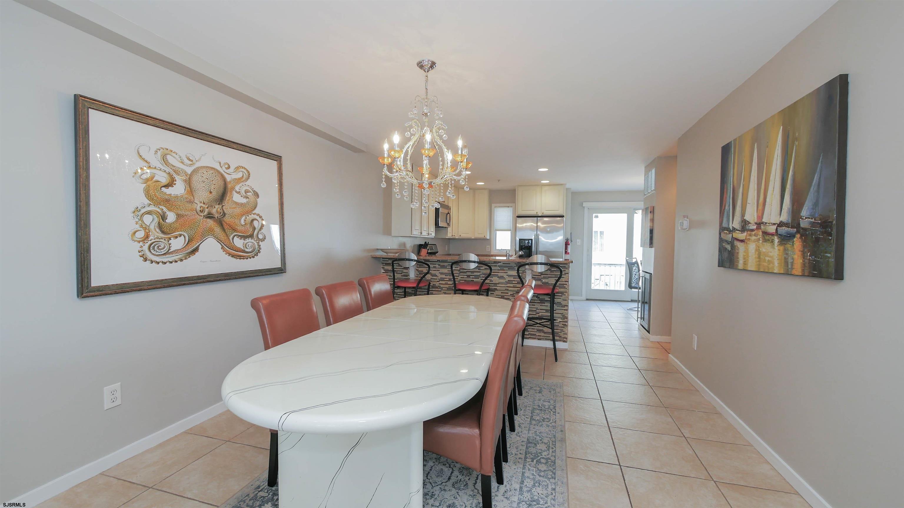 137 South Berkley Square, Unit B Atlantic City, NJ 08401 - Photo 13 of 42 a dining room with furniture and window