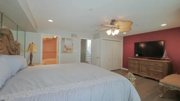 a view of a room with a sink and a toilet