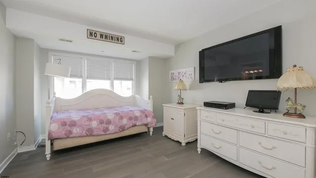 a view of a room with a sink and a toilet