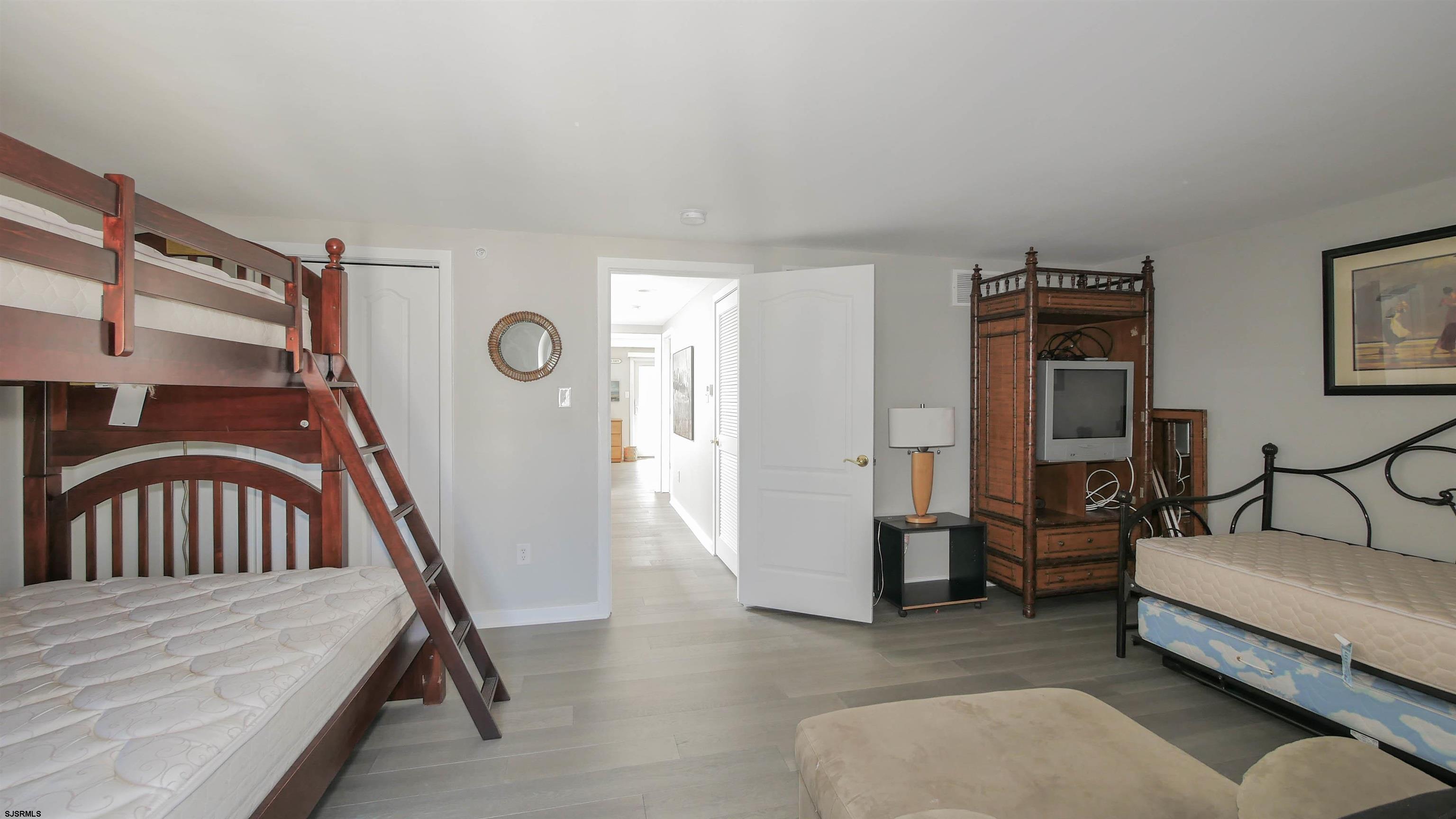 137 South Berkley Square, Unit B Atlantic City, NJ 08401 - Photo 38 of 42 a bedroom with furniture and a window