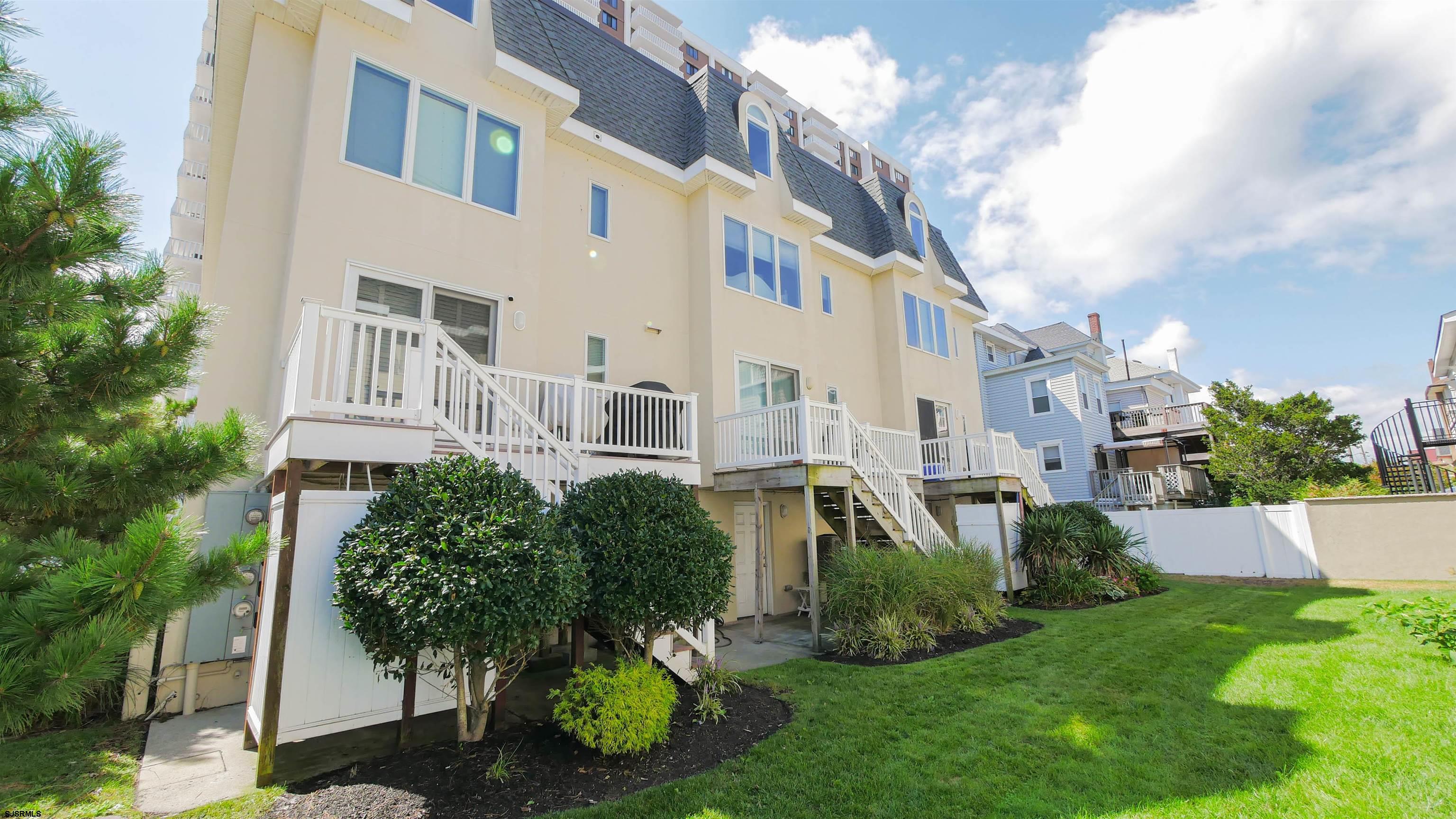 137 South Berkley Square, Unit B Atlantic City, NJ 08401 - Photo 40 of 42 a view of a house with a yard and plants