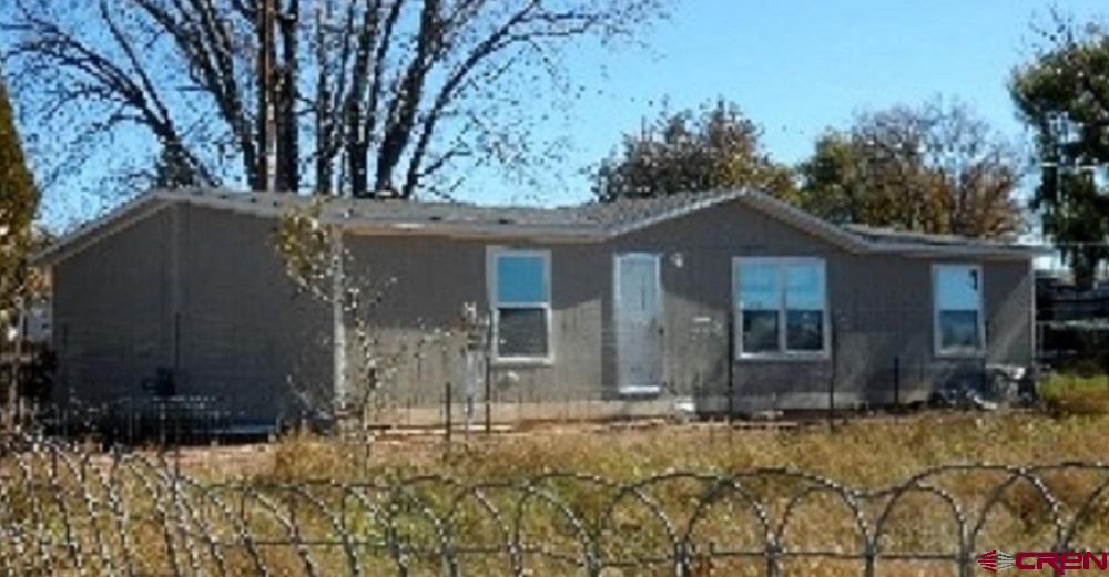 a front view of house with yard